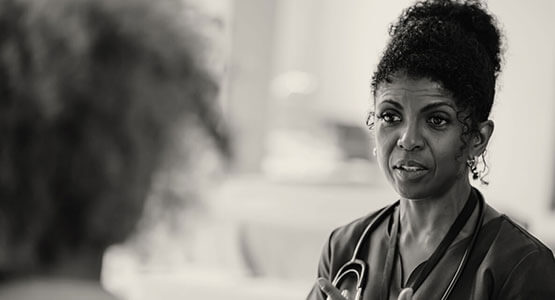 Clinician talking to patient Emergency medicine accelerated care case study image